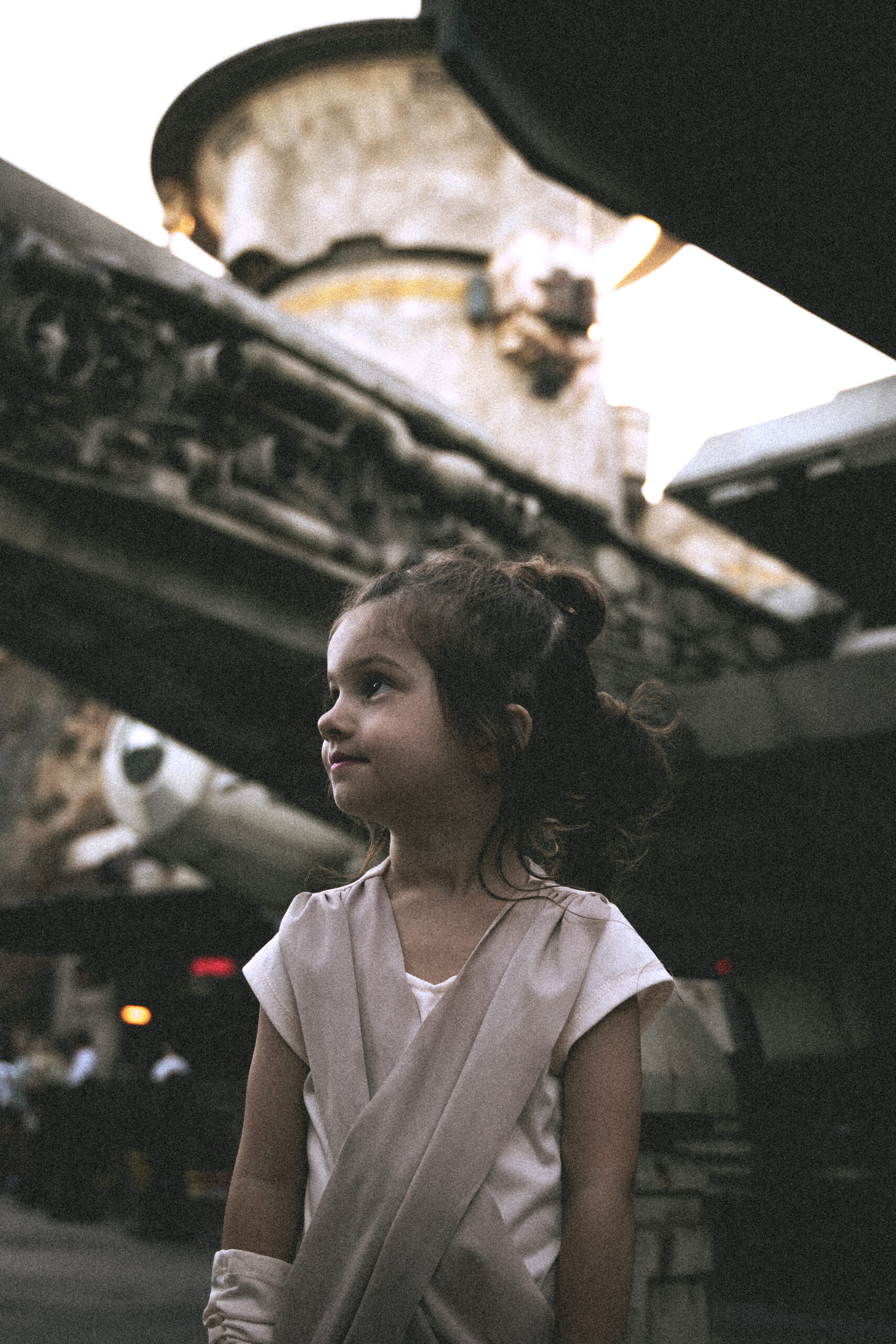 A young girl dressed as Rey from Star Wars in Star Wars Land at Disneyland in Anaheim, California